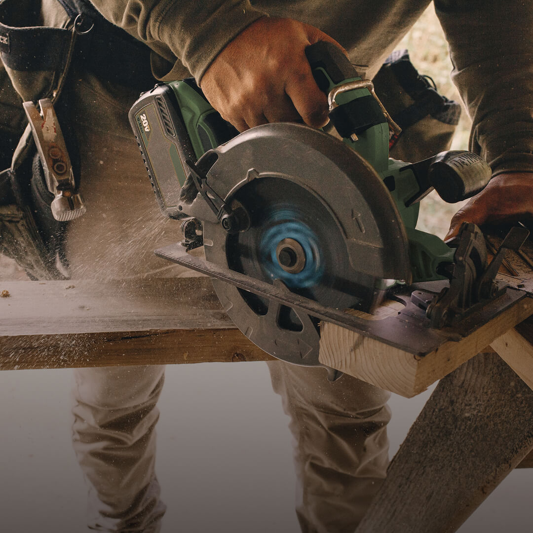 Circular saw cutting lumber