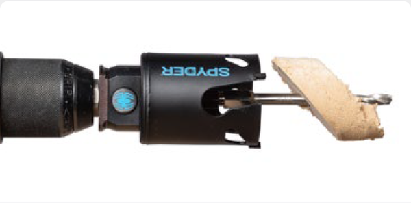 Drill through material at desired angle and remove the core